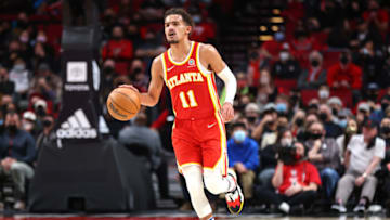 PORTLAND, OREGON - JANUARY 03: Trae Young #11 of the Atlanta Hawks dribbles down the court against the Atlanta Hawks during the fourth quarter at Moda Center on January 03, 2022 in Portland, Oregon. NOTE TO USER: User expressly acknowledges and agrees that, by downloading and or using this photograph, User is consenting to the terms and conditions of the Getty Images License Agreement. (Photo by Abbie Parr/Getty Images)