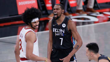 NEW YORK, NEW YORK - MAY 16: Kevin Durant #7 of the Brooklyn Nets reacts after Jarrett Allen #31 of the Cleveland Cavaliers beats him to the tip-off during the first half at Barclays Center on May 16, 2021 in the Brooklyn borough of New York City. NOTE TO USER: User expressly acknowledges and agrees that, by downloading and or using this photograph, User is consenting to the terms and conditions of the Getty Images License Agreement. (Photo by Sarah Stier/Getty Images)