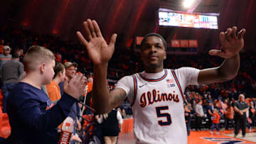 CHAMPAIGN, IL - DECEMBER 29: Illinois Fighting Illini guard Tevian Jones (5) high fives fans at the conclusion of the college basketball game between the North Carolina A&T Aggies and the Illinois Fighting Illini on December 29, 2019, at the State Farm Center in Champaign, Illinois. (Photo by Michael Allio/Icon Sportswire via Getty Images)