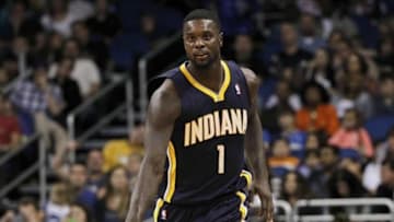 Feb 9, 2014; Orlando, FL, USA; Indiana Pacers shooting guard Lance Stephenson (1) reacts after he made a three pointer against the Orlando Magic during the second quarter at Amway Center. Mandatory Credit: Kim Klement-USA TODAY Sports