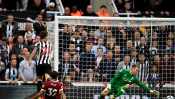 NEWCASTLE UPON TYNE, ENGLAND - OCTOBER 01: Joselu of Newcastle United scores his sides first goal during the Premier League match between Newcastle United and Liverpool at St. James Park on October 1, 2017 in Newcastle upon Tyne, England. (Photo by Stu Forster/Getty Images)