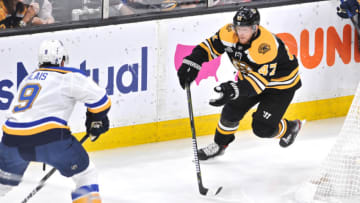 BOSTON, MA - JUNE 6: Boston Bruins defenseman Torey Krug (47) tries to get past St. Louis Blues left wing Sammy Blais (9) with the puck. During Game 5 of the Stanley Cup Finals featuring the Boston Bruins against the St. Louis Blues on June 6, 2019 at TD Garden in Boston, MA. (Photo by Michael Tureski/Icon Sportswire via Getty Images)