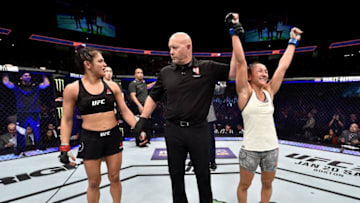 LAS VEGAS, NV - DECEMBER 30: (R-L) Carla Esparza celebrates her unanimous-decision victory over Cynthia Calvillo in their women's strawweight bout during the UFC 219 event inside T-Mobile Arena on December 30, 2017 in Las Vegas, Nevada. (Photo by Jeff Bottari/Zuffa LLC/Zuffa LLC via Getty Images)
