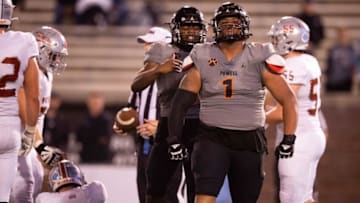 Powell's Walter Nolen (1) celebrates a sack during the TSSAA Class 5A BlueCross Bowl football game between Powell and Page held at Finley Stadium in Chattanooga, Tenn., on Friday, Dec. 3, 2021.Kns Powell Page Football Bp