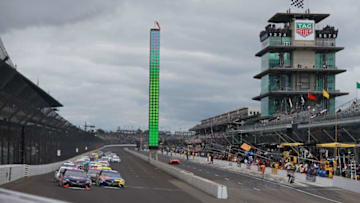 INDIANAPOLIS, IN - SEPTEMBER 10: Denny Hamlin, driver of the #11 FedEx Possibilities Toyota, and Kyle Busch, driver of the #18 M and M's Caramel Toyota (Photo by Matt Sullivan/Getty Images)