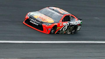 May 29, 2016; Concord, NC, USA; Sprint Cup Series driver Martin Truex Jr. (78) leads during the Coca-Cola 600 at Charlotte Motor Speedway. Mandatory Credit: Jim Dedmon-USA TODAY Sports