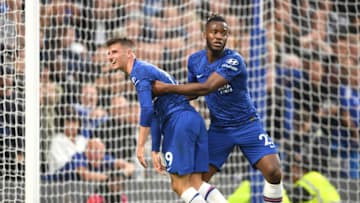 LONDON, ENGLAND - SEPTEMBER 22: Mason Mount of Chelsea is consoled by Michy Batshuayi of Chelsea after his missed effort during the Premier League match between Chelsea FC and Liverpool FC at Stamford Bridge on September 22, 2019 in London, United Kingdom. (Photo by Laurence Griffiths/Getty Images)