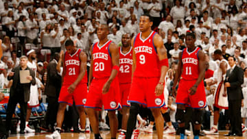 MIAMI, FL - APRIL 16: Thaddeus Young #21 Jodie Meeks #20 Elton Brand #42 Jrue Holiday #11 and Andre Iguodala #9 of the Philadelphia 76ers look dejected during a game against the Miami Heat in Game One of the Eastern Conference Quarterfinals between Philadelphia 76ers and the Miami Heat in the 2011 NBA Playoffs on April 16, 2011 at American Airlines Arena in Miami, Florida. NOTE TO USER: User expressly acknowledges and agrees that, by downloading and/or using this Photograph, User is consenting to the terms and conditions of the Getty Images License Agreement. Mandatory copyright notice: Copyright NBAE 2011 (Photo by Issac Baldizon/NBAE via Getty Images)