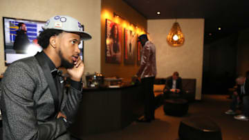 BROOKLYN, NY - JUNE 21: Marvin Bagley III makes a phone call after being selected second overall by the Sacramento Kings at the 2018 NBA Draft on June 21, 2018 at the Barclays Center in Brooklyn, New York. NOTE TO USER: User expressly acknowledges and agrees that, by downloading and/or using this photograph, user is consenting to the terms and conditions of the Getty Images License Agreement. Mandatory Copyright Notice: Copyright 2018 NBAE (Photo by Jon Lopez/NBAE via Getty Images)
