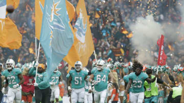 LONDON, ENGLAND - OCTOBER 01: The Miami Dolphins players run out onto the pitch before the NFL game between the Miami Dolphins and the New Orleans Saints at Wembley Stadium on October 1, 2017 in London, England. (Photo by Henry Browne/Getty Images)