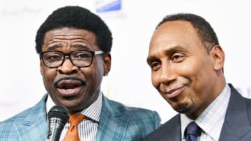 BEVERLY HILLS, CALIFORNIA - AUGUST 20: (L-R) Michael Irvin and Stephen A. Smith banter at the Harold and Carole Pump Foundation Gala at The Beverly Hilton on August 20, 2021 in Beverly Hills, California. (Photo by Rodin Eckenroth/Getty Images)
