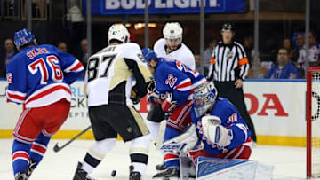 Apr 19, 2016; New York, NY, USA; New York Rangers goalie Henrik Lundqvist (30) makes a save in front of Pittsburgh Penguins center Sidney Crosby (87) and New York Rangers defenseman Dan Boyle (22) during the first period of game three of the first round of the 2016 Stanley Cup Playoffs at Madison Square Garden. Mandatory Credit: Brad Penner-USA TODAY Sports