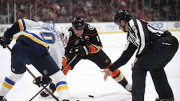 ANAHEIM, CALIFORNIA - MARCH 06: Oskar Sundqvist #70 of the St. Louis Blues faces off against Ryan Getzlaf #15 of the Anaheim Ducks during the first period of a game at Honda Center on March 06, 2019 in Anaheim, California. (Photo by Sean M. Haffey/Getty Images)