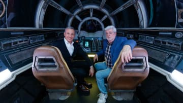 ANAHEIM, CA - MAY 29: In this handout photo provided by Disneyland Resort, Walt Disney Company Chairman and CEO Bob Iger (R), and Star Wars creator George Lucas pose inside Millennium Falcon: Smugglers Run at Star Wars: Galaxy's Edge at Disneyland Park in Anaheim, California, May 29, 2019. (Photo by Joshua Sudock/ Disneyland Resort via Getty Images)