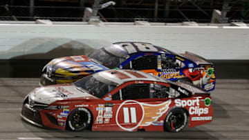 DARLINGTON, SC - SEPTEMBER 03: Denny Hamlin, driver of the #11 Sport Clips Toyota, leads Kyle Busch, driver of the #18 M&M's Caramel Toyota, during the Monster Energy NASCAR Cup Series Bojangles' Southern 500 at Darlington Raceway on September 3, 2017 in Darlington, South Carolina. (Photo by Jerry Markland/Getty Images)