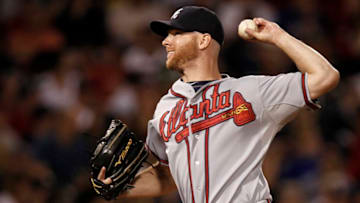 BOSTON, MA - JUNE 23: Jonny Venters #39 of the Atlanta Braves pitches against the Boston Red Sox during the seventh inning of the interleague game at Fenway Park on June 23, 2012 in Boston, Massachusetts. (Photo by Winslow Townson/Getty Images)