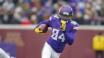 Dec 7, 2014; Minneapolis, MN, USA; Minnesota Vikings wide receiver Cordarrelle Patterson (84) rushes against the New York Jets for 6 yards in the second quarter at TCF Bank Stadium. The Vikings win 30-24. Mandatory Credit: Bruce Kluckhohn-USA TODAY Sports
