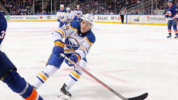 ELMONT, NEW YORK - DECEMBER 30: Peyton Krebs #19 of the Buffalo Sabres skates against the New York Islanders at the UBS Arena on December 30, 2021 in Elmont, New York. (Photo by Bruce Bennett/Getty Images)
