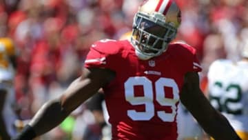 Sep 8, 2013; San Francisco, CA, USA; San Francisco 49ers linebacker Aldon Smith (99) celebrates after forcing a quarterback fumble against the Green Bay Packers during the first quarter at Candlestick Park. Mandatory Credit: Kelley L Cox-USA TODAY Sports