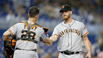 MIAMI, FLORIDA - MAY 30: Will Smith #13 of the San Francisco Giants celebates with Buster Posey #28 after defeating the Miami Marlins 3-1 at Marlins Park on May 30, 2019 in Miami, Florida. (Photo by Michael Reaves/Getty Images)
