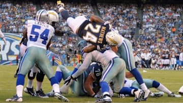 Aug 7, 2014; San Diego, CA, USA; San Diego Chargers running back Ryan Mathews (24) loses the football during the first quarter against the Dallas Cowboys at Qualcomm Stadium. The Cowboys would recover for a touchback. Mandatory Credit: Jake Roth-USA TODAY Sports