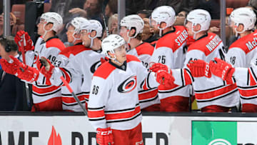 ANAHEIM, CA - DECEMBER 7: Teuvo Teravainen #86 of the Carolina Hurricanes celebrates his first-period power-play goal with the team bench during the game against the Anaheim Ducks at Honda Center on December 7, 2016 in Anaheim, California. (Photo by Debora Robinson/NHLI via Getty Images) ***Local Caption ***