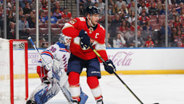 SUNRISE, FL - NOVEMBER 16: Aleksander Barkov #16 of the Florida Panthers gets into position in front of Goaltender Henrik Lundqvist # 30 of the New York Rangers at the BB&T Center on November 16, 2019 in Sunrise, Florida. The Panthers defeated the Rangers 4-3. (Photo by Joel Auerbach/Getty Images)