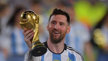 BUENOS AIRES, ARGENTINA - MARCH 23: Lionel Messi of Argentina celebrates with the FIFA World Cup trophy during celebrations after an international friendly match between Argentina and Panama at Estadio Más Monumental Antonio Vespucio Liberti on March 23, 2023 in Buenos Aires, Argentina. (Photo by Marcelo Endelli/Getty Images)