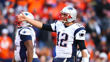 Jan 24, 2016; Denver, CO, USA; New England Patriots quarterback Tom Brady (12) reacts against the Denver Broncos in the AFC Championship football game at Sports Authority Field at Mile High. Mandatory Credit: Mark J. Rebilas-USA TODAY Sports