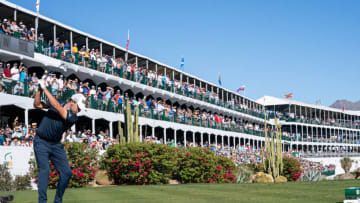 Feb 13, 2022; Scottsdale, Arizona, USA; Patrick Cantlay plays hit tee shot on the par 3 16th hole during the final round of the WM Phoenix Open golf tournament. Mandatory Credit: Allan Henry-USA TODAY Sports