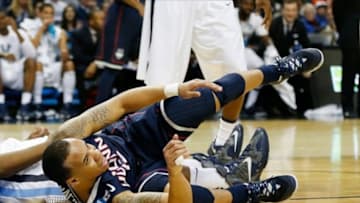 Mar 22, 2014; Buffalo, NY, USA; Connecticut Huskies guard Shabazz Napier (13) in the game against the Villanova Wildcats during the third round of the 2014 NCAA Basketball Tournament at First Niagara Center. Mandatory Credit: Kevin Hoffman-USA TODAY Sports