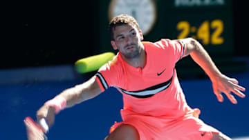 MELBOURNE, AUSTRALIA - JANUARY 23: Grigor Dimitrov of Bulgaria plays a forehand in his quarter-final match against Kyle Edmund of Great Britain on day nine of the 2018 Australian Open at Melbourne Park on January 23, 2018 in Melbourne, Australia. (Photo by Paul Rovere/Getty Images)