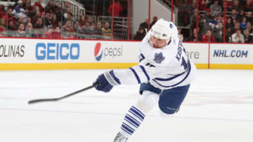 RALEIGH, NC - JANUARY 24: Tomas Kaberle #15 of the Toronto Maple Leafs fires a shot on goal during an NHL ge Carolina Hurricanes ame against t on January 24, 2011 at RBC Center in Raleigh, North Carolina. (Photo by Gregg Forwerck/NHLI via Getty Images)