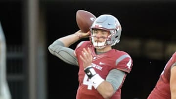 Sep 3, 2016; Pullman, WA, USA; Washington State Cougars quarterback Luke Falk (4) drops back for a pass against the Eastern Washington Eagles during the first half at Martin Stadium. Mandatory Credit: James Snook-USA TODAY Sports