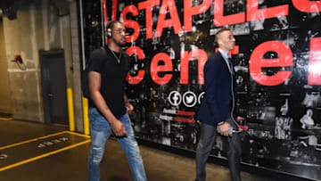 LOS ANGELES, CA - APRIL 18: Derrick Favors #15 and Dante Exum #11 of the Utah Jazz arrive at the arena before Game Two of the Western Conference Quarterfinals of the 2017 NBA Playoffs on April 18, 2017 at STAPLES Center in Los Angeles, California. Copyright 2017 NBAE (Photo by Andrew D. Bernstein/NBAE via Getty Images)
