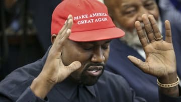 WASHINGTON, DC - OCTOBER 11: (AFP OUT) Rapper Kanye West speaks during a meeting with U.S. President Donald Trump in the Oval office of the White House on October 11, 2018 in Washington, DC. (Photo by Oliver Contreras - Pool/Getty Images)