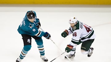 Jan 23, 2016; San Jose, CA, USA; San Jose Sharks center Joe Pavelski (8) scores a goal on a shot against Minnesota Wild defenseman Jared Spurgeon (46) during the third period at SAP Center at San Jose. San Jose defeated Minnesota 4-3. Mandatory Credit: Kelley L Cox-USA TODAY Sports
