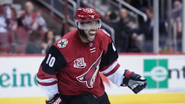 Nov 1, 2016; Glendale, AZ, USA; Arizona Coyotes left wing Anthony Duclair (10) celebrates a goal by left wing Jamie McGinn (88) during the second period against San Jose Sharks at Gila River Arena. Mandatory Credit: Matt Kartozian-USA TODAY Sports