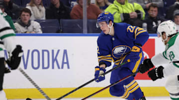 Jan 20, 2022; Buffalo, New York, USA; Buffalo Sabres right wing Jack Quinn (22) skates up ice with the puck during the second period against the Dallas Stars at KeyBank Center. Mandatory Credit: Timothy T. Ludwig-USA TODAY Sports
