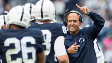 UNIVERSITY PARK, PA - SEPTEMBER 02: Head coach James Franklin of the Penn State Nittany Lions congratulates Mike Gesicki