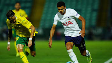PACOS DE FERREIRA, PORTUGAL - AUGUST 19: Dane Scarlett of Tottenham Hotspur FC with Fernando Fonseca of FC Pacos de Ferreira in action during the UEFA Europa Conference League match between FC Pacos de Ferreira and Tottenham Hotspur at Estadio Municipal da Capital do Movel on August 19, 2021 in Pacos de Ferreira, Portugal. (Photo by Gualter Fatia/Getty Images)