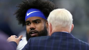 ARLINGTON, TX - SEPTEMBER 30: Ezekiel Elliott #21 of the Dallas Cowboys talks with owner Jerry Jones before the game against the Detroit Lions at AT&T Stadium on September 30, 2018 in Arlington, Texas. (Photo by Tom Pennington/Getty Images)