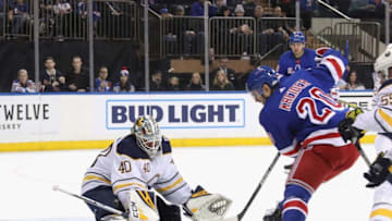 NEW YORK, NEW YORK - FEBRUARY 07: Carter Hutton #40 of the Buffalo Sabres makes the second period save on Chris Kreider #20 of the New York Rangers at Madison Square Garden on February 07, 2020 in New York City. (Photo by Bruce Bennett/Getty Images)