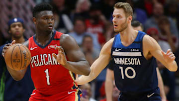 NEW ORLEANS, LOUISIANA - MARCH 03: Zion Williamson #1 of the New Orleans Pelicans drives against Jake Layman #10 of the Minnesota Timberwolves during the second half at the Smoothie King Center on March 03, 2020 in New Orleans, Louisiana. NOTE TO USER: User expressly acknowledges and agrees that, by downloading and or using this Photograph, user is consenting to the terms and conditions of the Getty Images License Agreement. (Photo by Jonathan Bachman/Getty Images)