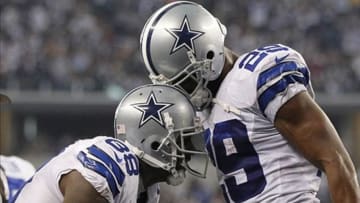 Dec 15, 2013; Arlington, TX, USA; Dallas Cowboys running back DeMarco Murray (29) celebrates scoring a touchdown with wide receiver Dez Bryant (88) in the second quarter against the Green Bay Packers at AT