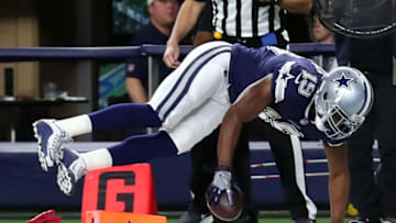 ARLINGTON, TX - NOVEMBER 05: Amari Cooper #19 of the Dallas Cowboys falls into the sideline after scoring a touchdown against the Tennessee Titans in the first quarter at AT&T Stadium on November 5, 2018 in Arlington, Texas. (Photo by Tom Pennington/Getty Images)