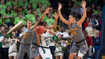 Jan 18, 2016; South Bend, IN, USA; Notre Dame Fighting Irish guard Lindsay Allen (15) looks to pass as Tennessee Lady Volunteers guard Andraya Carter (14) defends in the first quarter at the Purcell Pavilion. Notre Dame won 79-66. Mandatory Credit: Matt Cashore-USA TODAY Sports