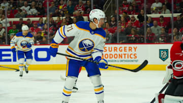 Apr 7, 2022; Raleigh, North Carolina, USA; Buffalo Sabres left wing Victor Olofsson (71) scores a goal against the Carolina Hurricanes during the second period at PNC Arena. Mandatory Credit: James Guillory-USA TODAY Sports