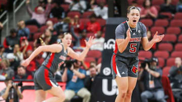 Louisville's Mykasa Robinson cheers as the Cards take the lead over Georgia Tech in the first half. Robinson had four points, four rebounds, two assists and two steals. Jan. 5, 2023Louisville Women Take On Georgia Tech