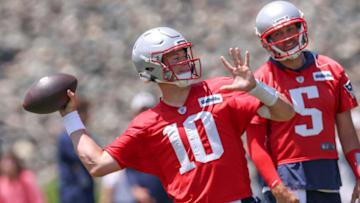 Jun 8, 2022; Foxborough, Massachusetts, USA; New England Patriots quarterback Mac Jones (10) during the New England Patriots minicamp at Gillette Stadium. Mandatory Credit: Paul Rutherford-USA TODAY Sports